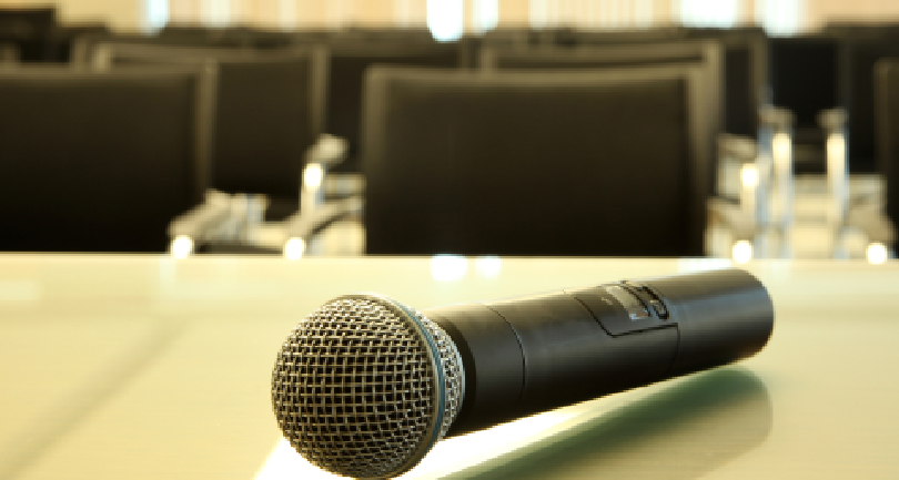 Image of the Bronx M702 Digital Array Microphone mounted on a boardroom ceiling
